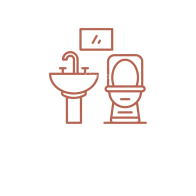 Badrum Toalett och handfat med spegel på väggen.